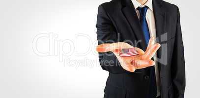 Composite image of mature businessman holding his hands out