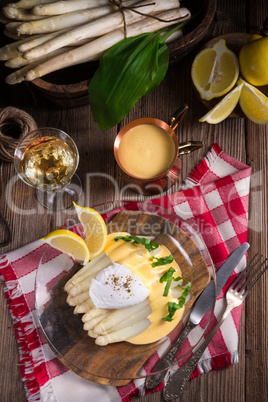 white asparagus served with a fine hollandaise sauce and Poache