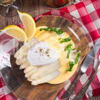 white asparagus served with a fine hollandaise sauce and Poache