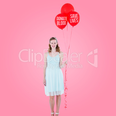Composite image of happy hipster woman holding balloons