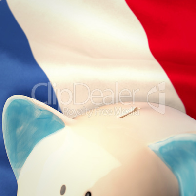 Composite image of piggy bank