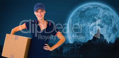 Composite image of happy delivery woman holding cardboard box