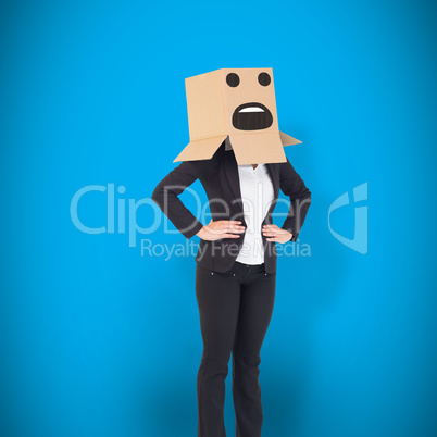 Composite image of businesswoman with box over head