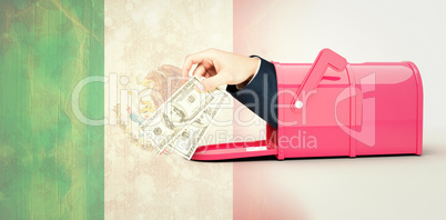 Composite image of hand holding hundred dollar bills