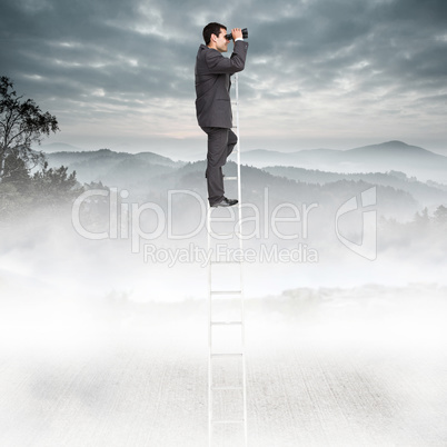 Composite image of businessman standing on ladder using binocula