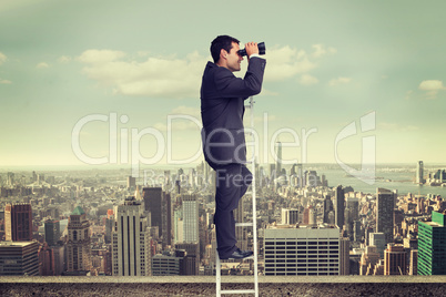 Composite image of businessman standing on ladder