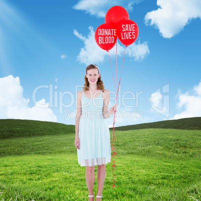 Composite image of happy hipster woman holding balloons