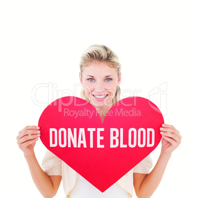 Composite image of attractive young blonde showing red heart