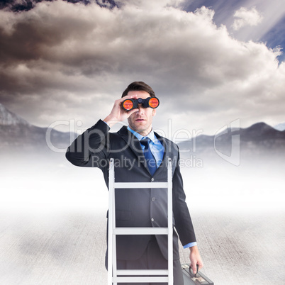 Composite image of businessman looking on a ladder