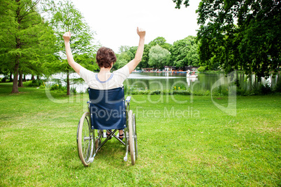 Woman with wheelchair in the park