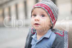 happy little baby boy wearing hat