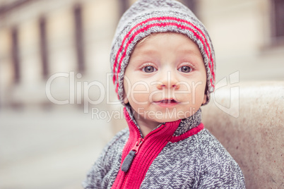 happy little baby boy wearing hat