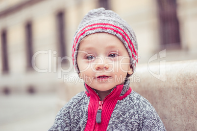 happy little baby boy wearing hat