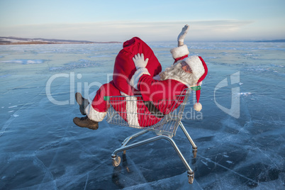 Santa Claus on winter lake ice