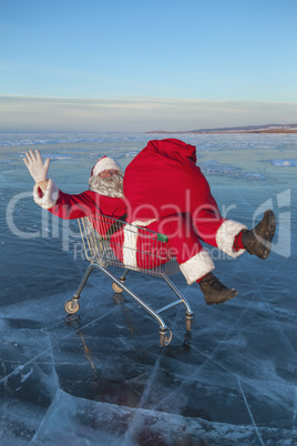 Santa Claus on winter lake ice