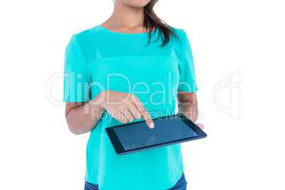 Casual brunette using tablet computer