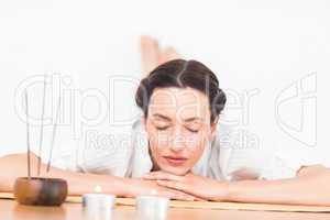 A woman in a meditation position