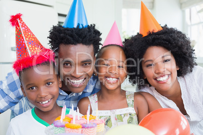 Happy family celebrating a birthday together