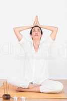 A woman in a meditation position