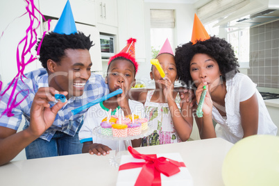 Happy family celebrating a birthday together