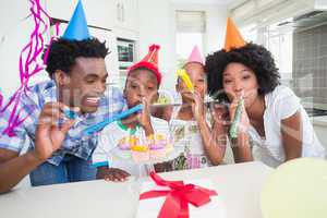 Happy family celebrating a birthday together