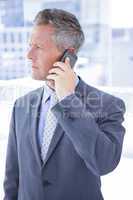 Anxious businessman on the phone
