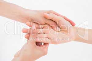 Physiotherapist doing hand massage
