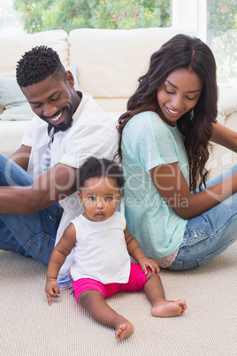 Happy parents with baby girl