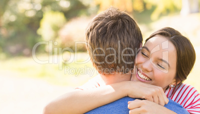 Cute couple hugging in the park