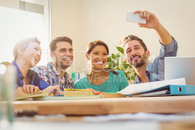 Group of colleagues taking a selfie