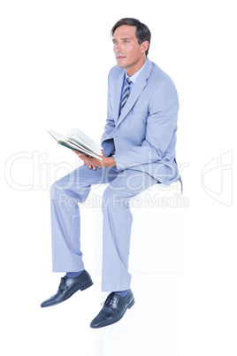 Focused businessman reading a document