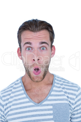 Surprised casual man looking at camera