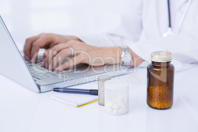 Doctor working on her laptop