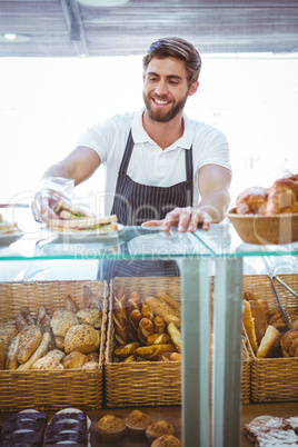 Happy server showing sandwich