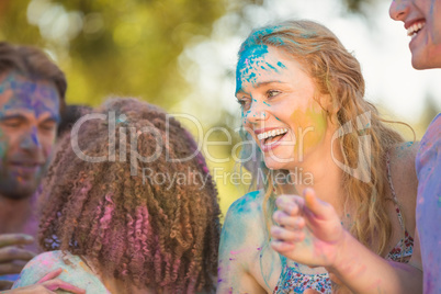 Friends having fun with powder paint