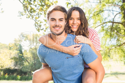 Cute couple having fun in park