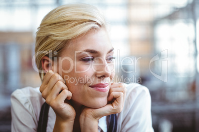 Selfassured female waitress smiling