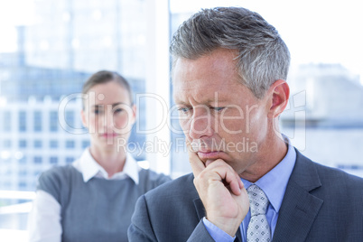 Puzzled businessman in the office