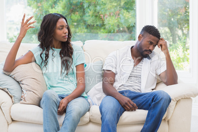 Couple having argument on the couch