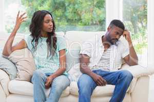 Couple having argument on the couch