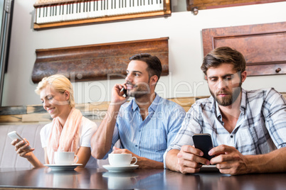 Colleagues working with smartphones