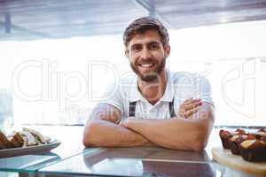 Handsome worker posing on the counter