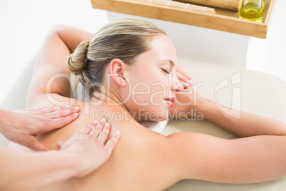 Woman enjoying a back massage