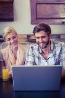 two colleagues working with laptop