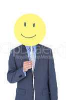 Businessman with happy smiley faced balloon
