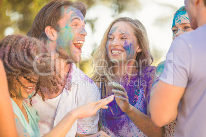 Friends having fun with powder paint