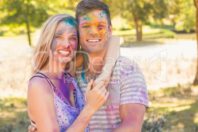 Young friends having fun with powder paint