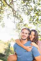 Cute couple having fun in park