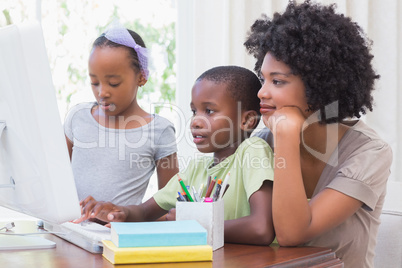 Happy family using the computer