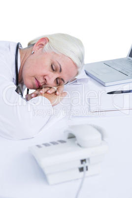 doctor sleeping on her desk
